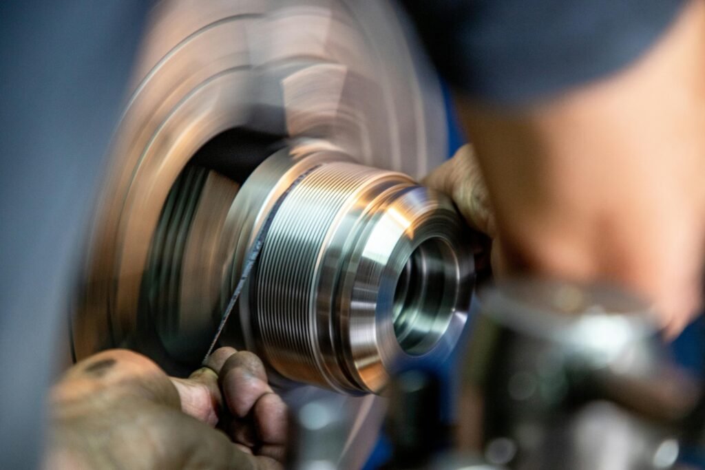 a worker grinding metal